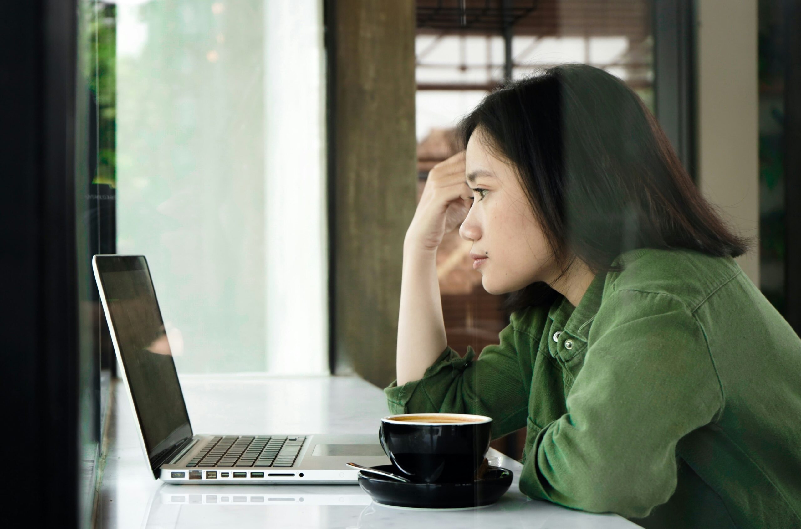 Woman Wondering - Best Remote Prop Trading Firms