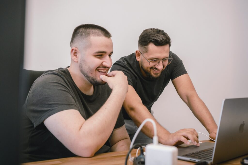 man smiling - Best Prop Firms for US Traders	