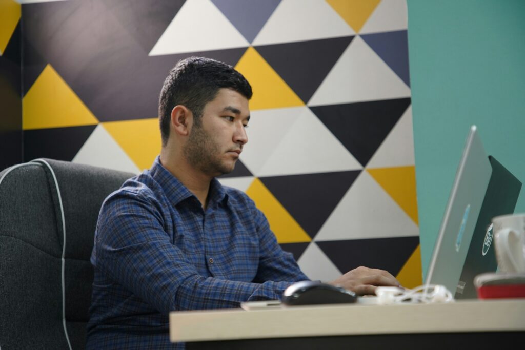 man working - Best Proprietary Trading Firms
