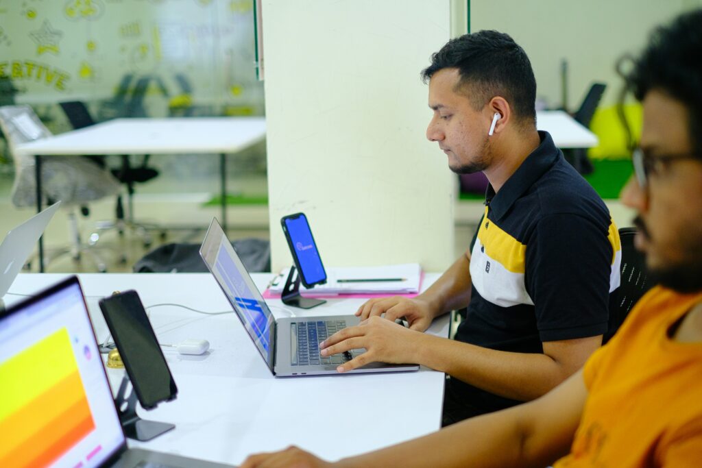 man in an office - Best Proprietary Trading Firms
