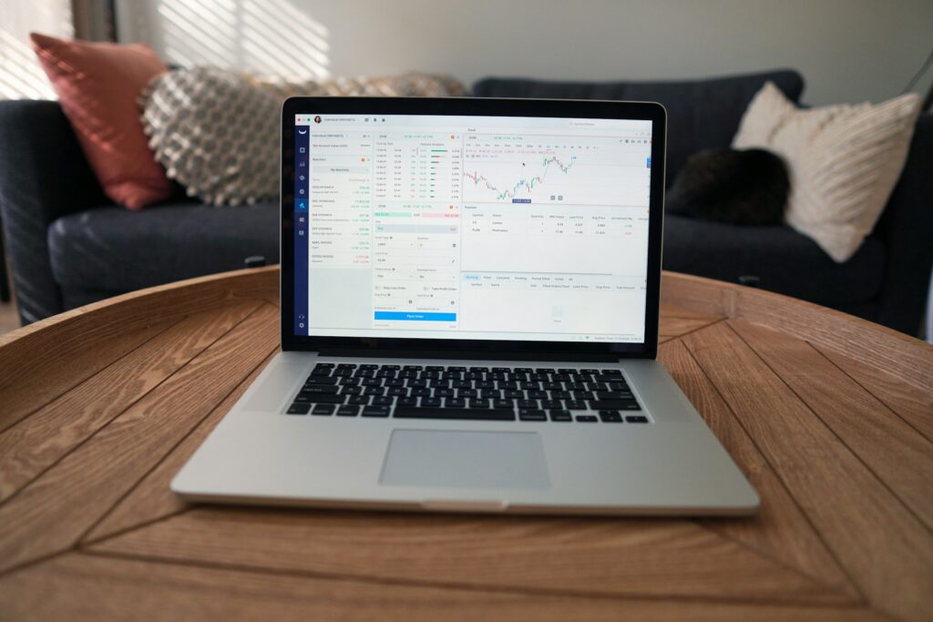 trading on a laptop - No Minimum Trading Days Prop Firm