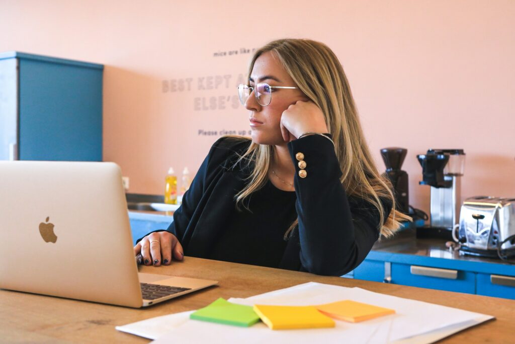 woman thinking - Day Trading Prop Firms