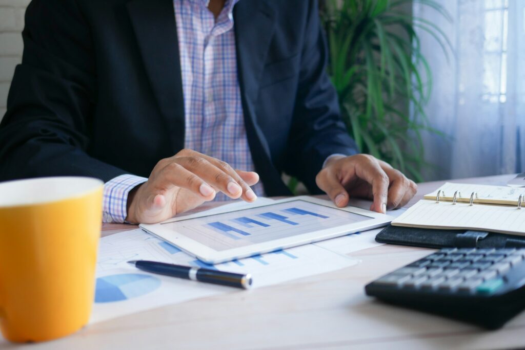 Person Analyzing - Best Remote Prop Trading Firms