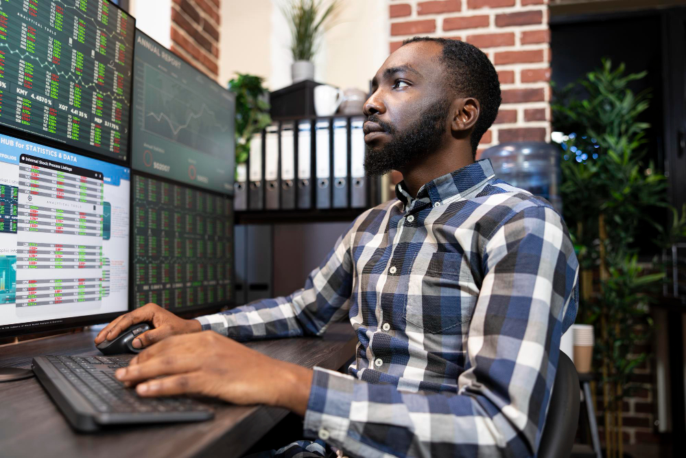 man on a desktop - What is Orb in Trading