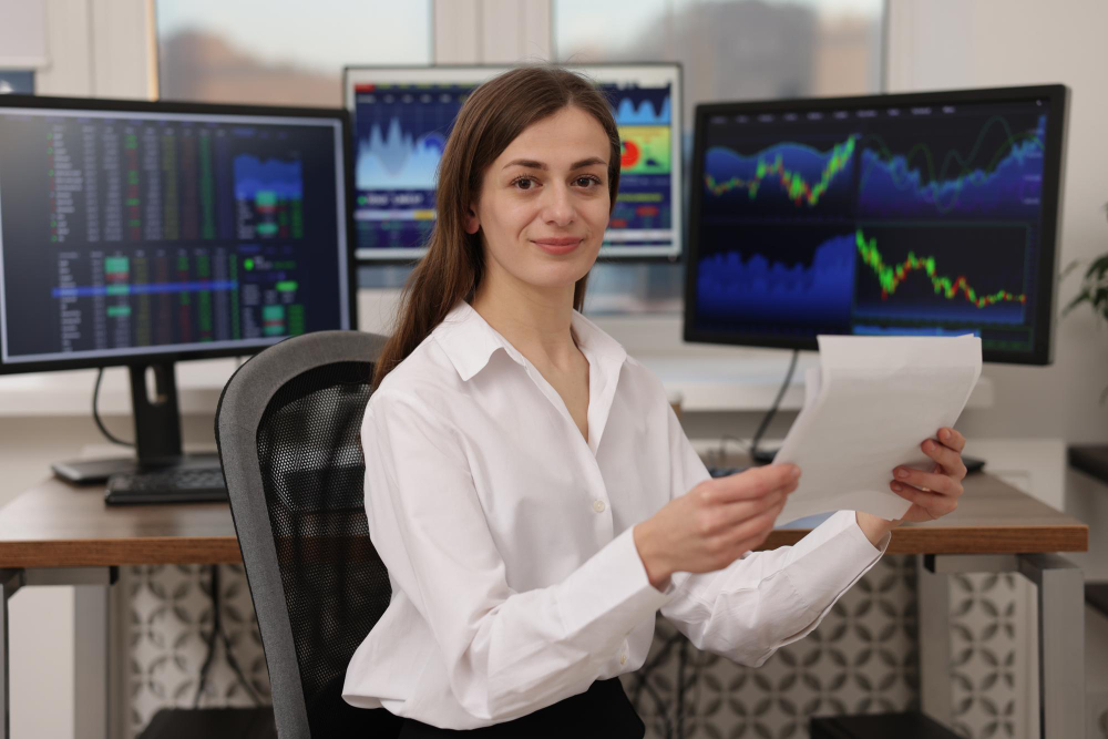 woman holding a file - What is Orb in Trading
